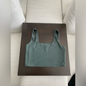 Body contour cropped compression top